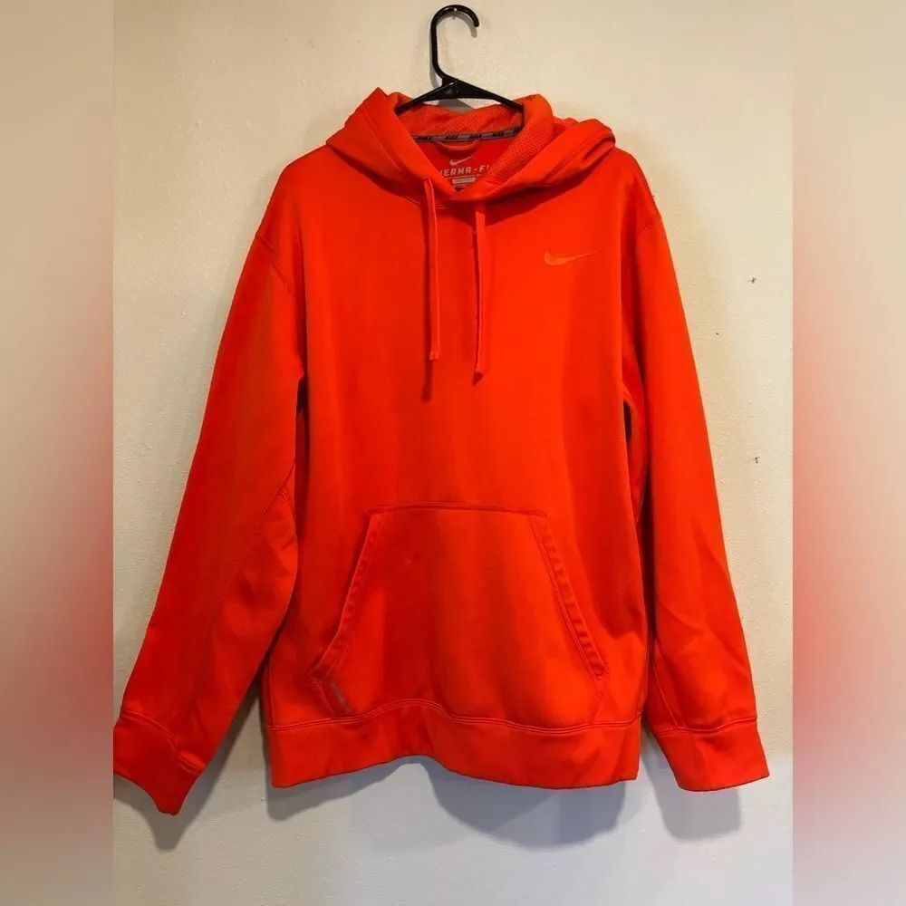 Nike Therma-FIT Pullover Hoodie in orange polyester fleece